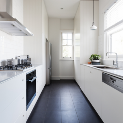 kitchen with black flooring, white fixtures